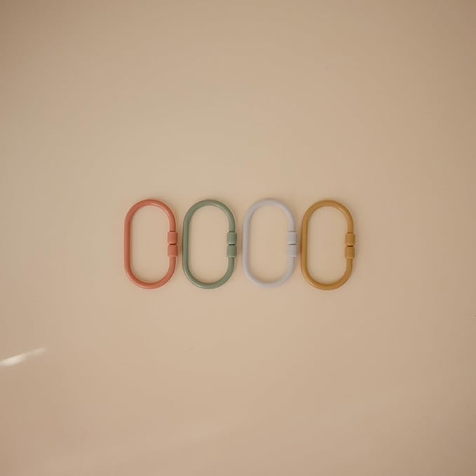 mushie Baby Chain Link Rings Toy 12-Count | Multiuse Car Seat Stroller Connecting Toy (Periwinkle, Mustard, Green, Coral)