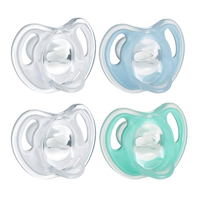 Tommee Tippee Ultra-Light Silicone Pacifier, 0-6 Months, Symmetrical One-Piece Design, BPA-Free Silicone Binkies, Clear/Blue/Green, Pack of 4